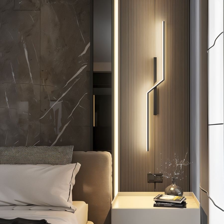 Residence Supply slant wall lamp with adjustable arm and modern design, mounted on a wall in a contemporary interior setting.