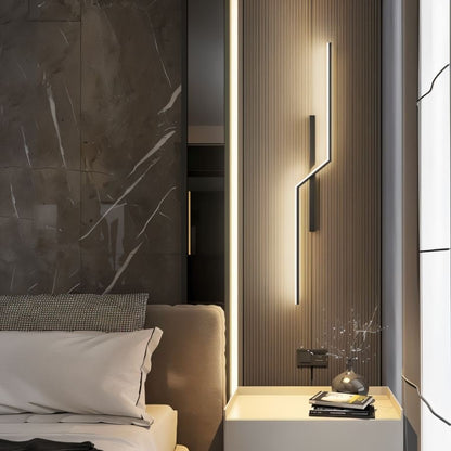 Residence Supply slant wall lamp with adjustable arm and modern design, mounted on a wall in a contemporary interior setting.