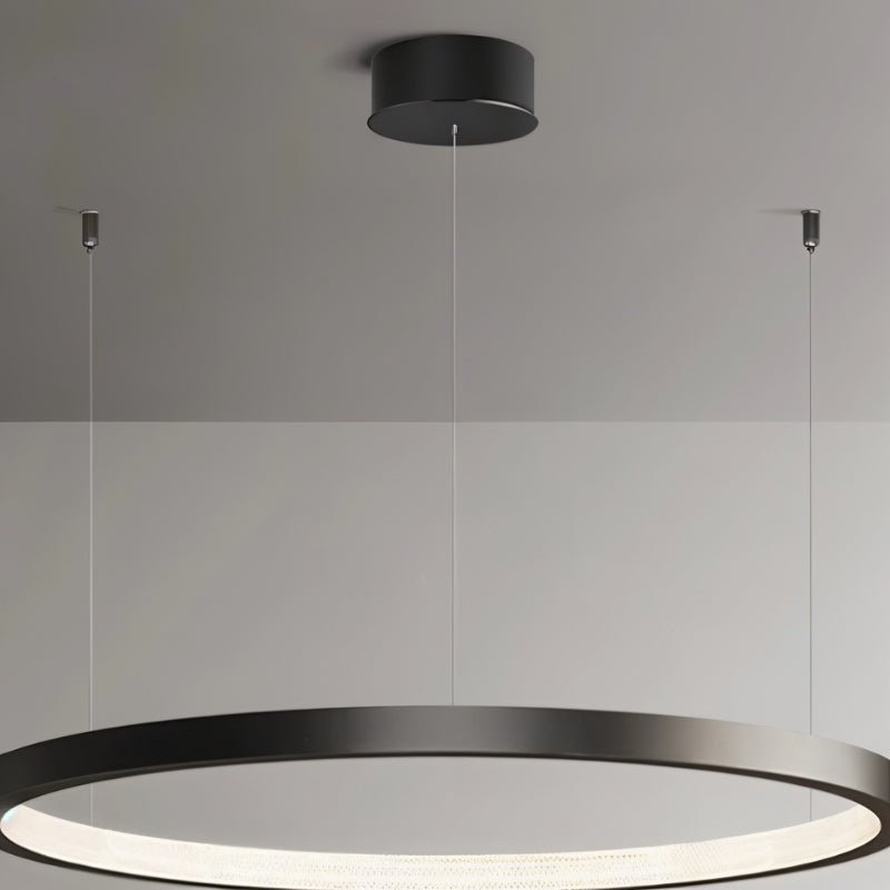 Solas Round Chandelier by Residence Supply featuring a modern circular design with multiple light bulbs and sleek metal finish.