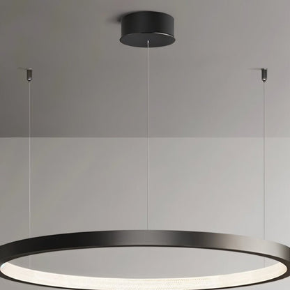 Solas Round Chandelier by Residence Supply featuring a modern circular design with multiple light bulbs and sleek metal finish.