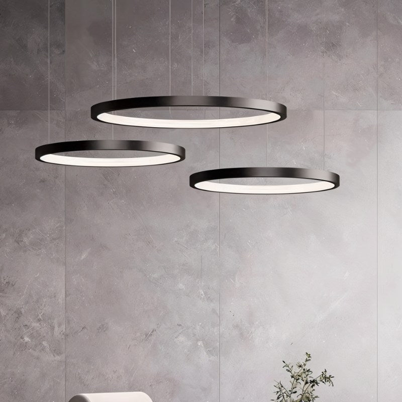 Elegant Solas Round Chandelier by Residence Supply featuring a modern circular design with hanging light fixtures.