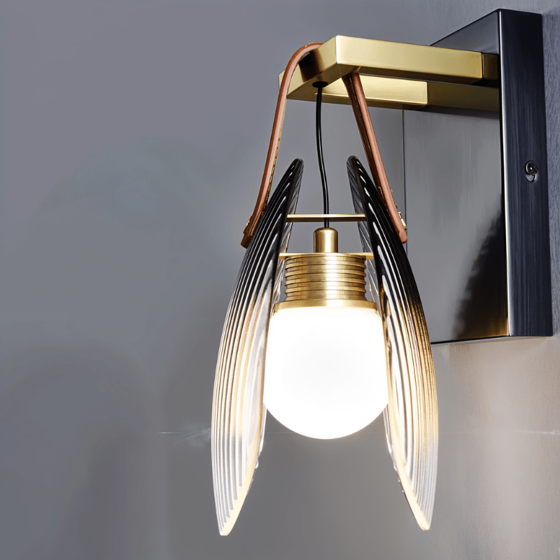Modern Solya Wall Lamp by Residence Supply featuring sleek design and metal finish, mounted on a wall with soft lighting effect.