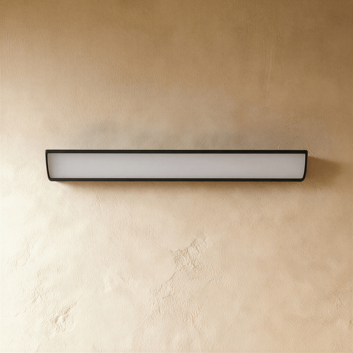 Outdoor wall lamp by Residence Supply featuring a modern design with a sleek metal finish and clear glass shade.