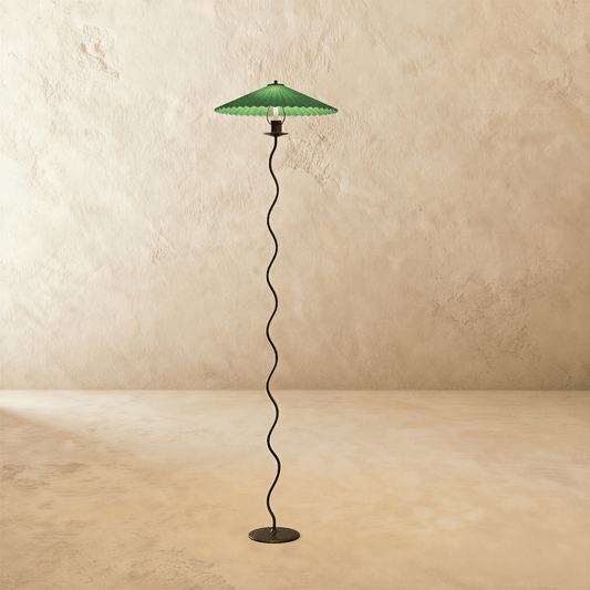 Residence Supply Squiggle Floor Lamp with curved metal stand and modern design, ideal for contemporary living room lighting.