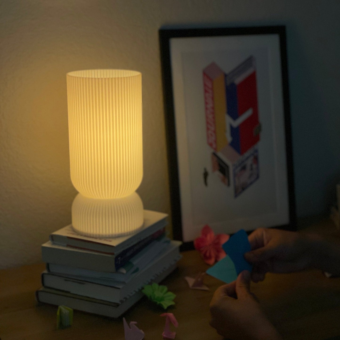 Terra Labs Stance Table Lamp with sleek modern design, featuring a cylindrical base and a fabric drum shade on a wooden table.