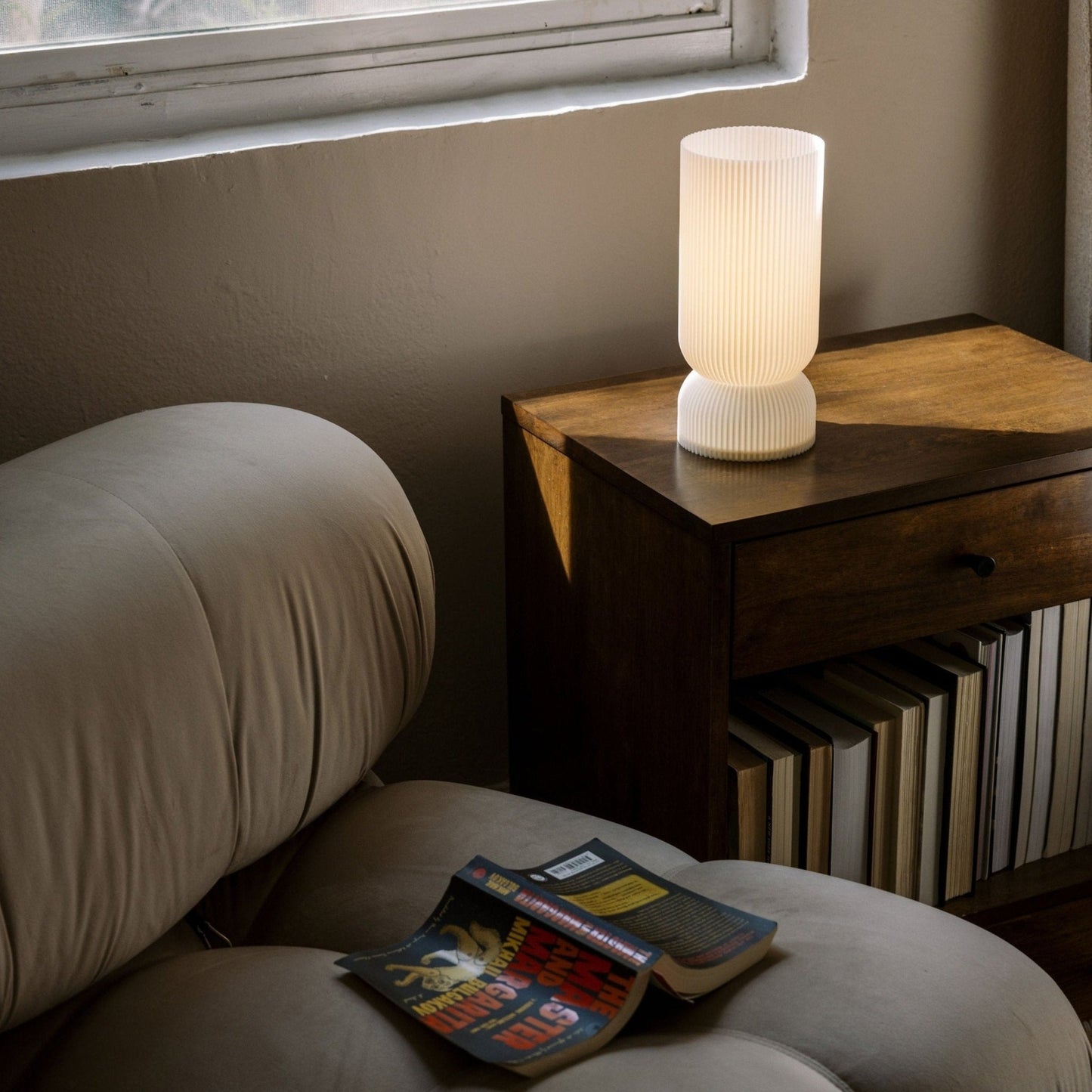 Terra Labs Stance Table Lamp with a sleek modern design, featuring a cylindrical base and a fabric lampshade.