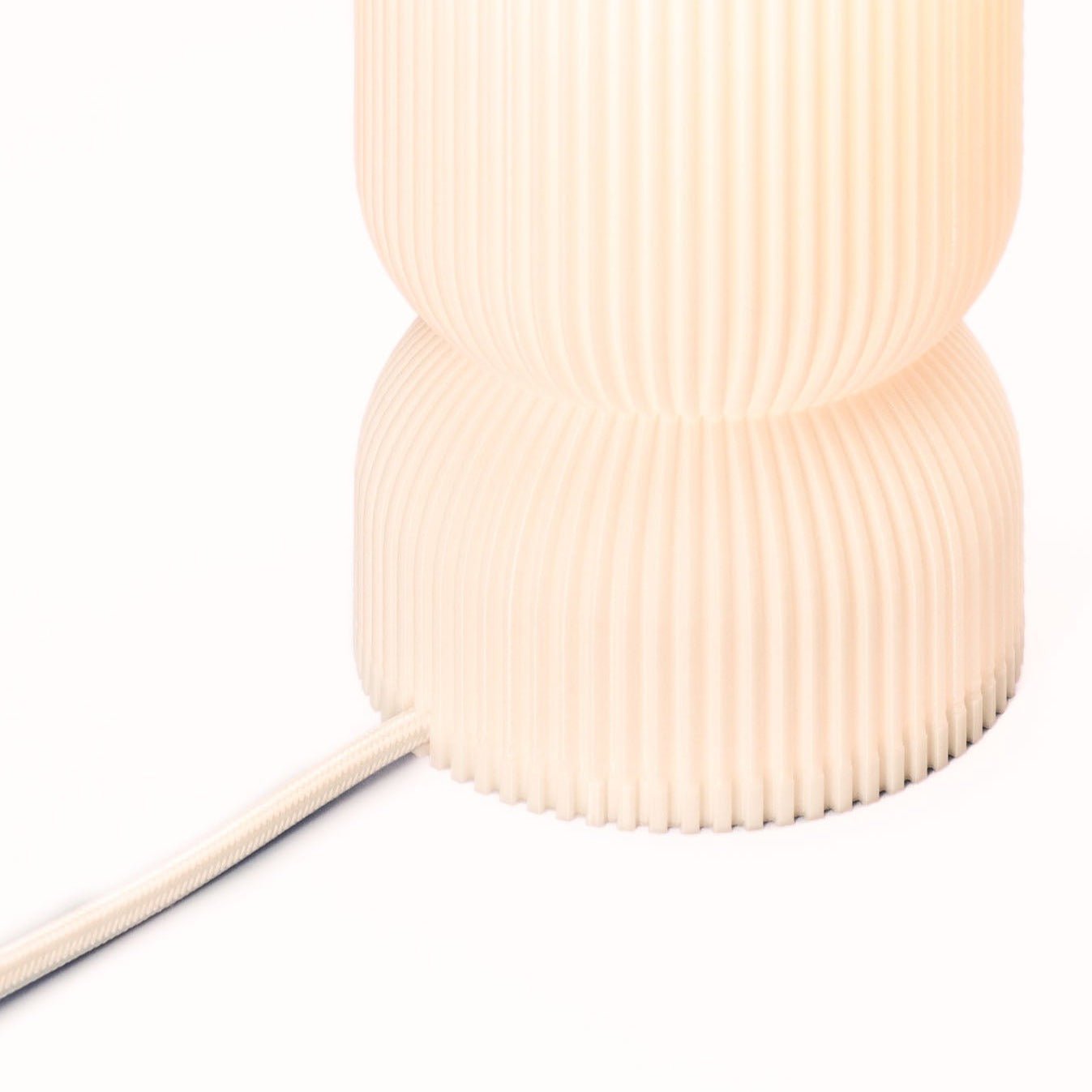 Terra Labs Stance Table Lamp with sleek modern design, featuring a cylindrical base and a fabric shade, ideal for contemporary decor.