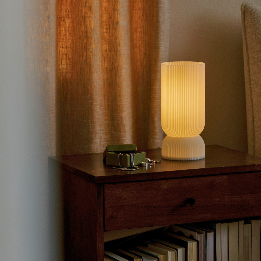 Terra Labs Stance Table Lamp with sleek modern design, featuring a cylindrical base and a fabric lampshade.