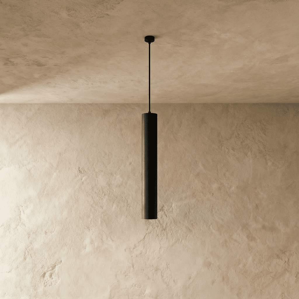 Talo Pendant Light by Residence Supply hanging from ceiling with a modern design and warm lighting effect.