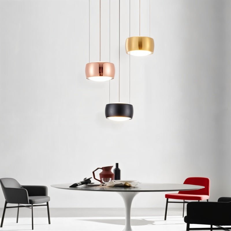Tejas Pendant Light by Residence Supply hanging from ceiling with a modern, sleek design and warm ambient lighting.