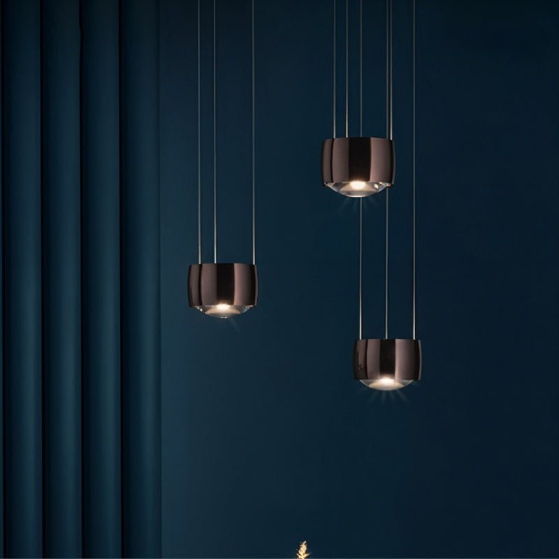 Tejas pendant light by Residence Supply featuring a modern design with a sleek metal finish and hanging cord.
