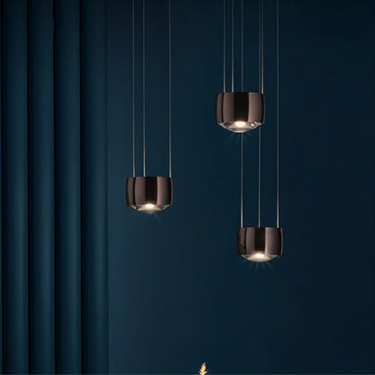 Tejas pendant light by Residence Supply featuring a modern design with a sleek metal finish and hanging cord.