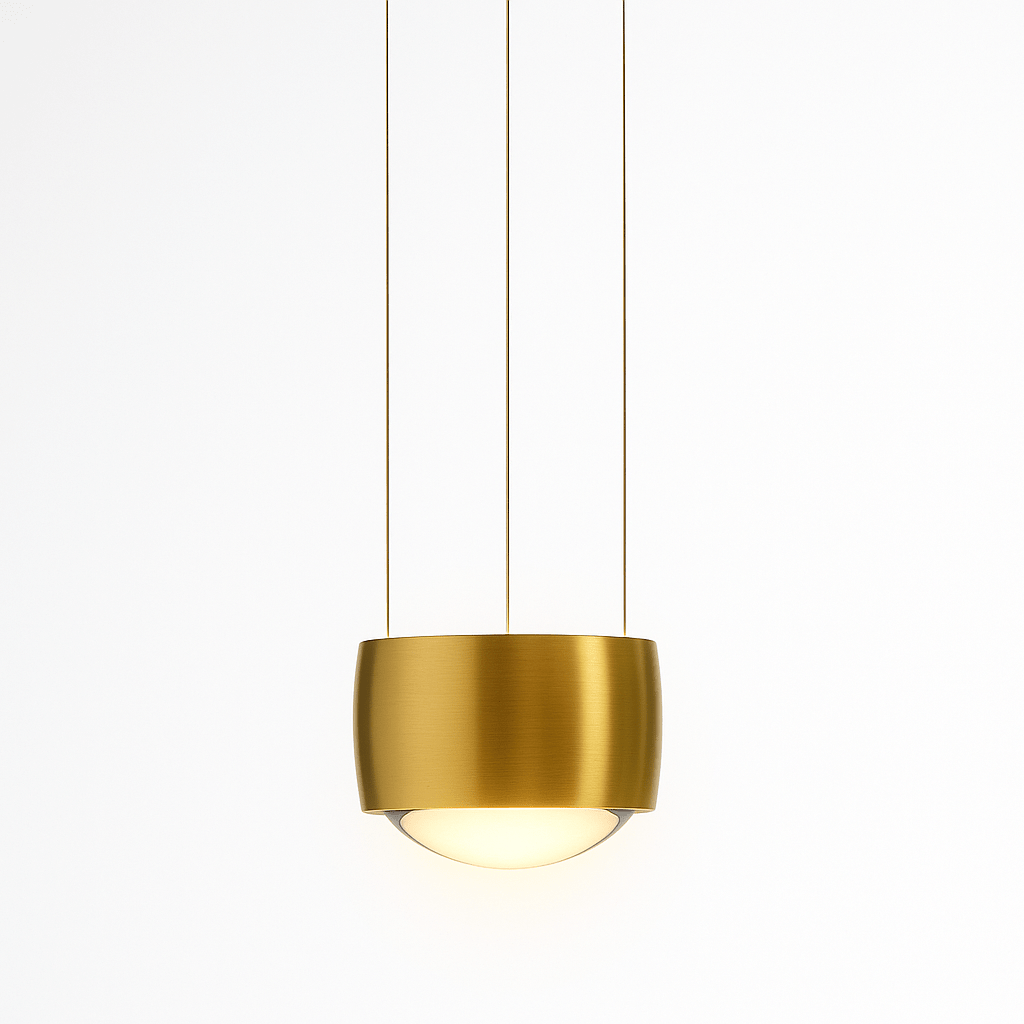 Tejas Pendant Light by Residence Supply hanging with a modern design, featuring a sleek metal shade and warm lighting.