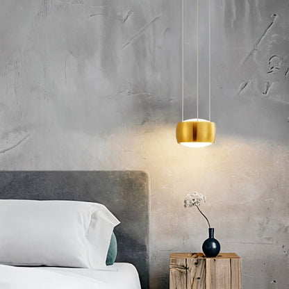 Tejas Pendant Light by Residence Supply hanging from ceiling with a modern design and warm lighting.