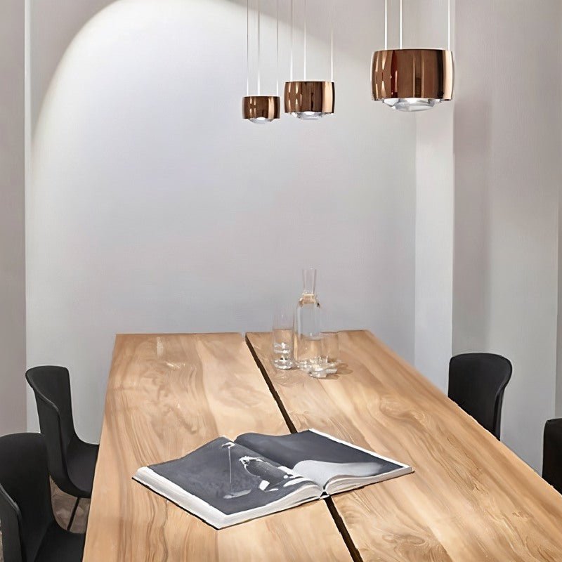Tejas Pendant Light by Residence Supply hanging from ceiling with a sleek modern design and warm illumination.