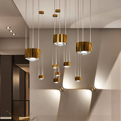 Tejas Pendant Light by Residence Supply hanging from ceiling, featuring a sleek modern design with a metal finish and glass shade.