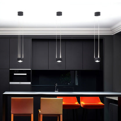 Tejas pendant light by Residence Supply featuring a sleek modern design with a metal finish and hanging cord.