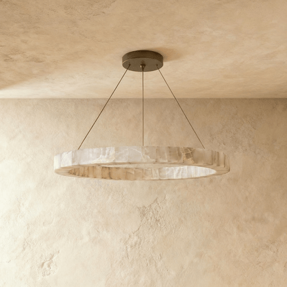 Teva Round Alabaster Chandelier by Residence Supply featuring a spherical alabaster design with warm lighting accents.