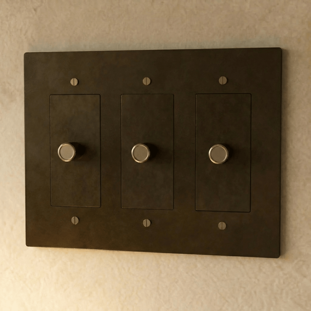 Brass dimmer switch by Residence Supply, 1 to 5 gang, featuring multiple toggle controls for lighting dimming and brightness adjustment.