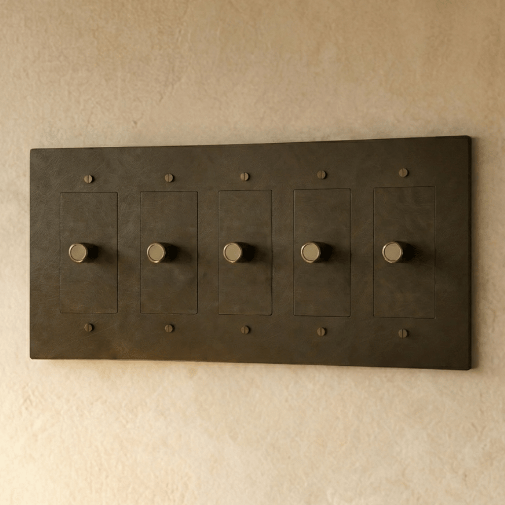 Brass dimmer switch for 1 to 5 gang installations by Residence Supply, showing multiple switches with brass finish and control dials.