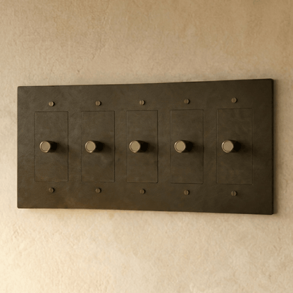 Brass dimmer switch for 1 to 5 gang installations by Residence Supply, showing multiple switches with brass finish and control dials.