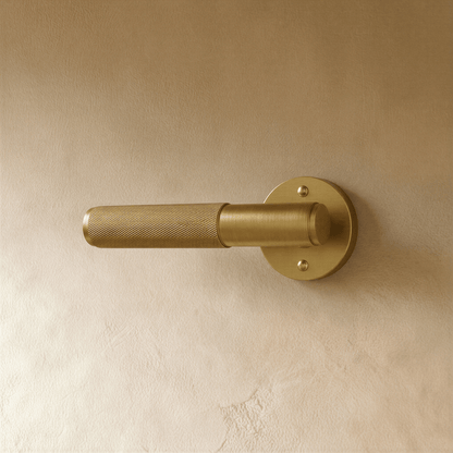 Brass door handle from Residence Supply with a polished finish, designed for elegant door hardware in home and garden settings.