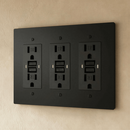 Residence Supply Brass Outlet 1 to 4 Gang, shown in a close-up of the metallic electrical outlet with multiple sockets.