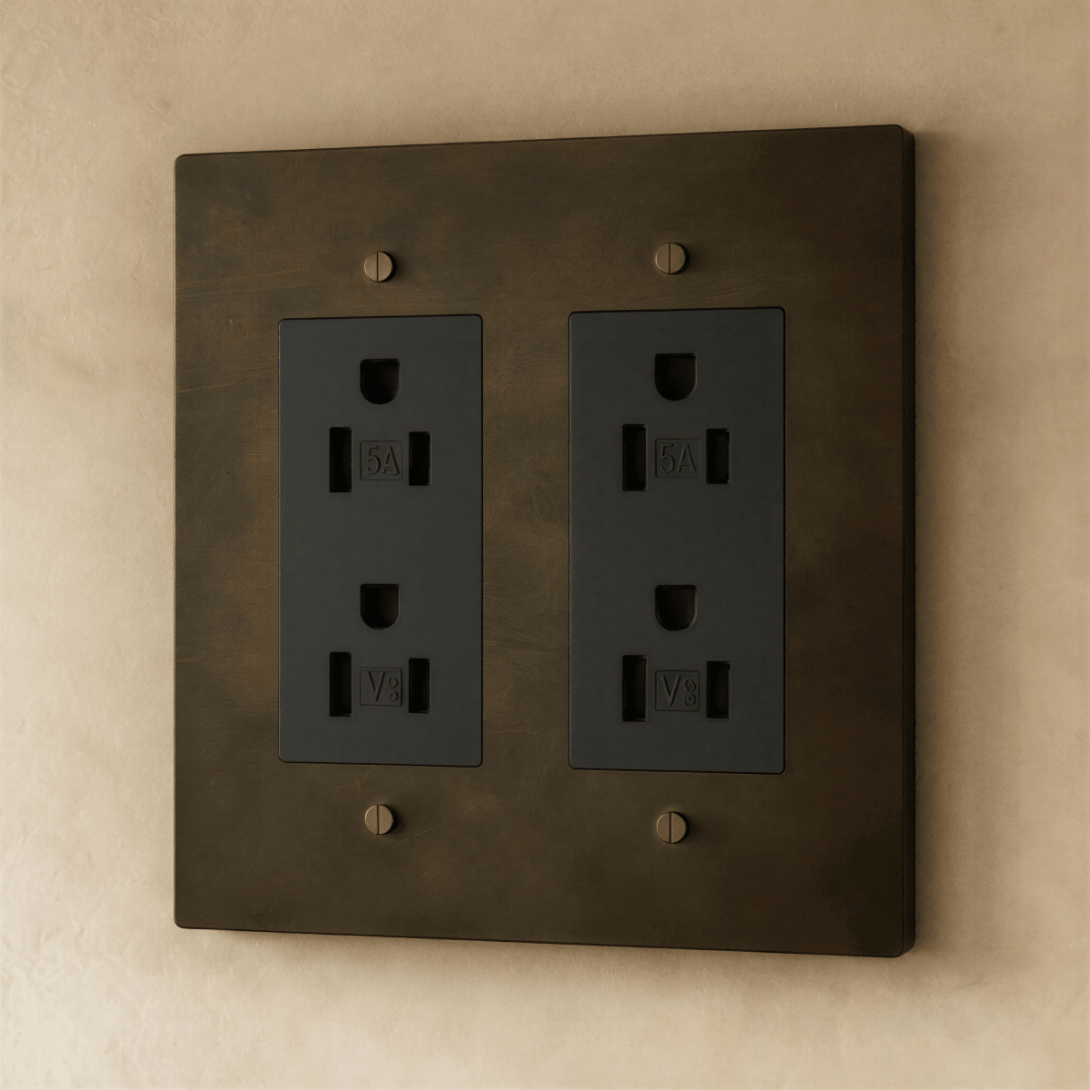 Close-up of Residence Supply Brass Outlet 1 to 4 gang electrical outlet with multiple socket openings and brass finish.