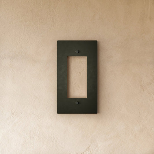 Bronze wall plate with patina finish for home and garden electrical covers, featuring a classic brass design.