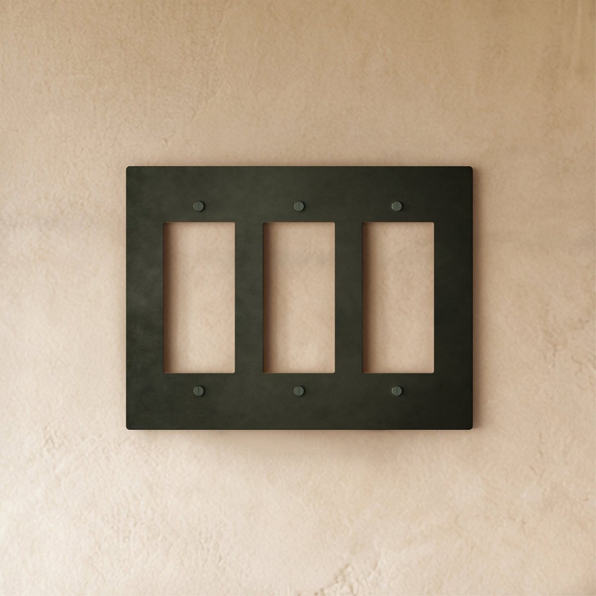 Bronze wall plate with patina finish for home and garden electrical covers, featuring a sleek brass design.
