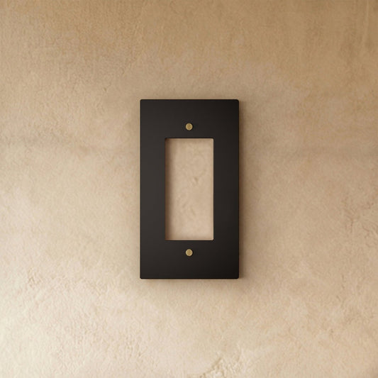 Night black brass wall plate from Residence Supply with brass accents, suitable for home electrical wall cover decoration.