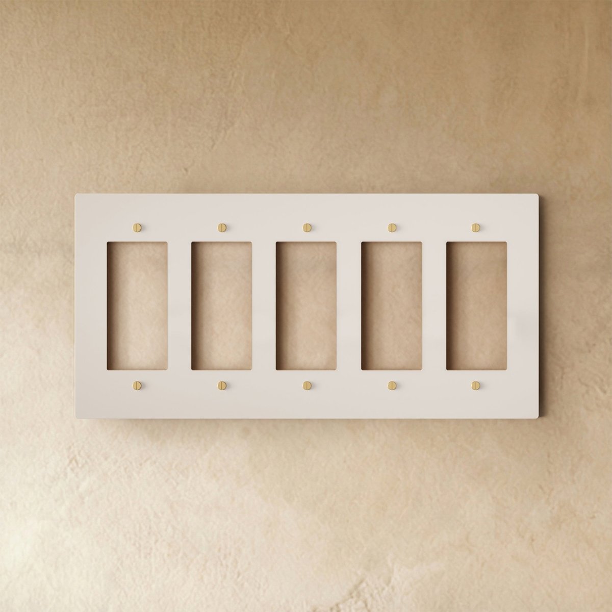 White brass wall plate from Residence Supply, featuring a sleek brass accent for home and garden electrical decor.