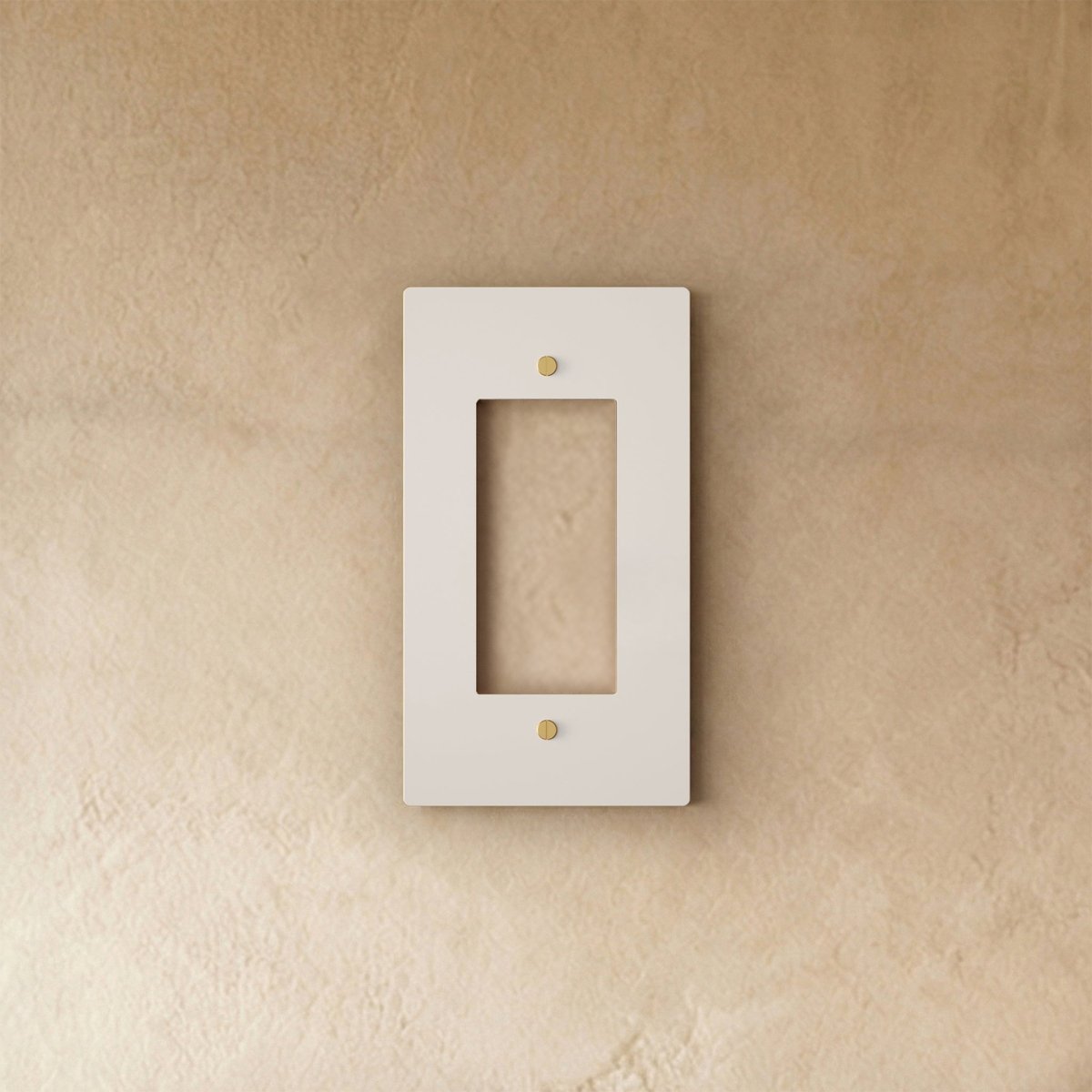 White wall plate with brass accents from Residence Supply, suitable for home electrical outlets and switches.