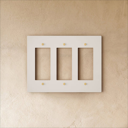 White wall plate with brass accents from Residence Supply, designed for electrical outlet or switch cover in home and garden decor.