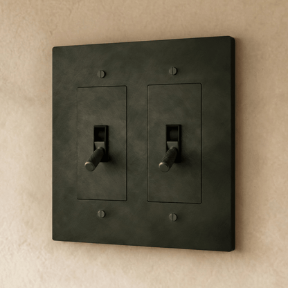 Brass toggle switch for 1 to 5 gang electrical switch panel, Residence Supply hardware with metallic finish and multiple toggle options.