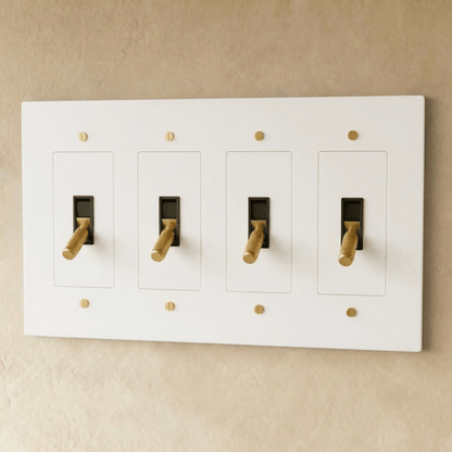 Brass toggle switch by Residence Supply, 1 to 5 gang, showing multiple toggle switches on a wall plate for electrical control.
