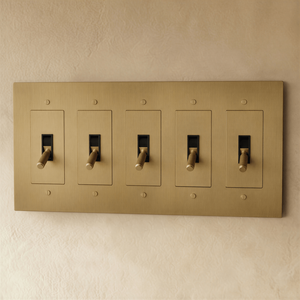 Brass toggle switch from Residence Supply with 1 to 5 gang options, shown in a close-up view of the switch mechanism.