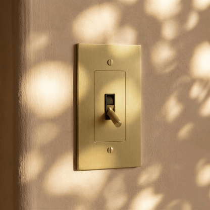 Residence Supply Brass Toggle Switch, 1 to 5 Gang, featuring metal toggle levers and sturdy brass construction.
