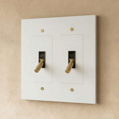 Brass toggle switch for 1 to 5 gang electrical installations, Residence Supply, showing close-up of switch and mounting hardware.
