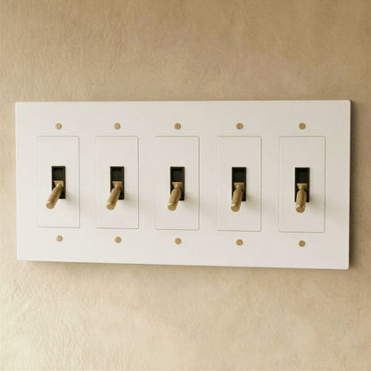 Brass toggle switch for 1 to 5 gang electrical control, Residence Supply brand, showing multiple switch options on a white background.
