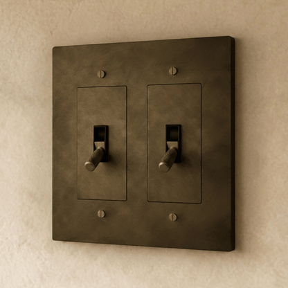 Brass toggle switch for 1 to 5 gang electrical control, Residence Supply brand, with metal toggle and mounting plate.