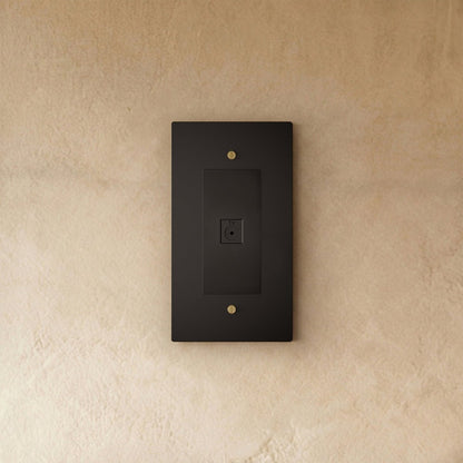 Brass 1-gang TV socket by Residence Supply, mounted on wall with visible wiring for audiovisual connection.