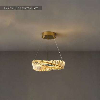 Elegant Tiwa Chandelier with multiple glass pendant lights and intricate metal frame, designed by Residence Supply.