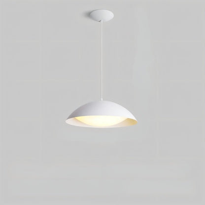 Toviel Pendant Light by Residence Supply featuring a sleek, modern metal design hanging from a ceiling fixture.