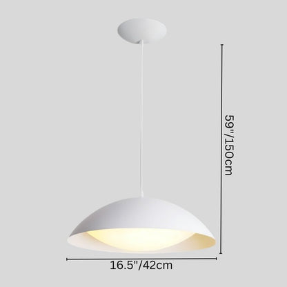 Toviel Pendant Light by Residence Supply hanging from ceiling with a modern design and warm lighting in a contemporary interior.