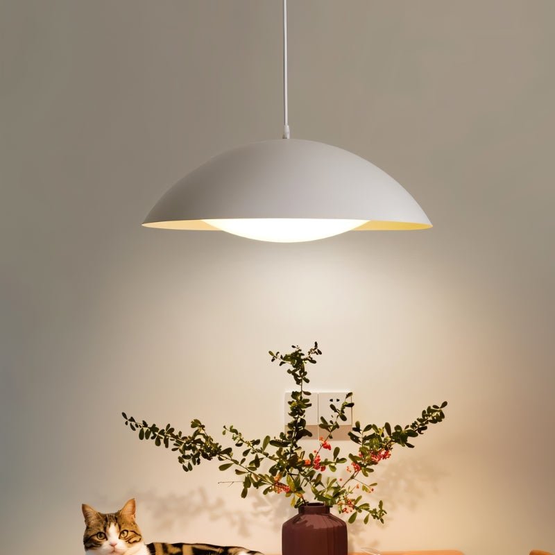 Toviel Pendant Light by Residence Supply hanging from ceiling with a sleek, modern design and warm ambient lighting.