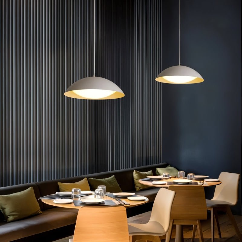 Toviel pendant light by Residence Supply featuring a modern design with a sleek metal finish and adjustable hanging cord.