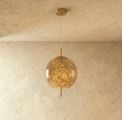 Residence Supply Twirl Pendant Light with swirling metal design hanging from ceiling fixture.