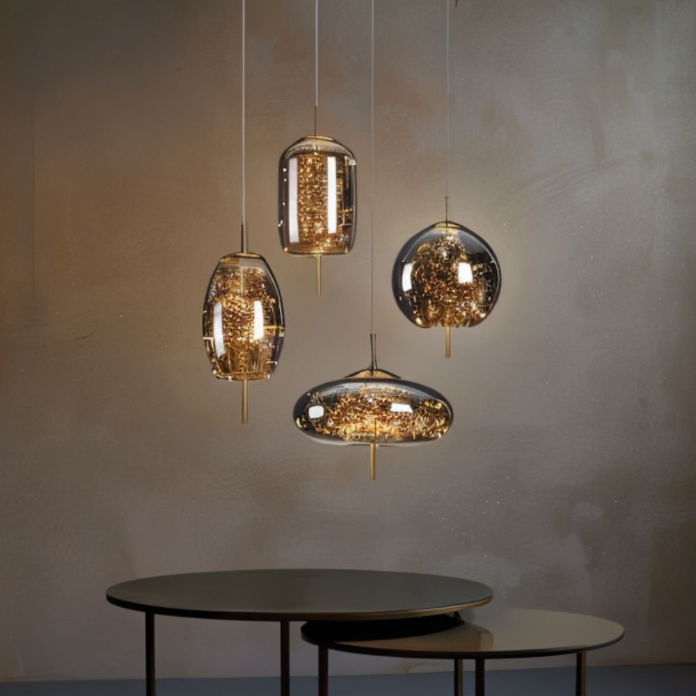 Residence Supply Twirl Pendant Light featuring a modern, swirling design with a sleek metal finish, ideal for contemporary interiors.