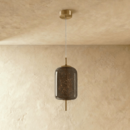Residence Supply Twirl Pendant Light with modern design, featuring a sleek, curved metal shade hanging from a ceiling mount.